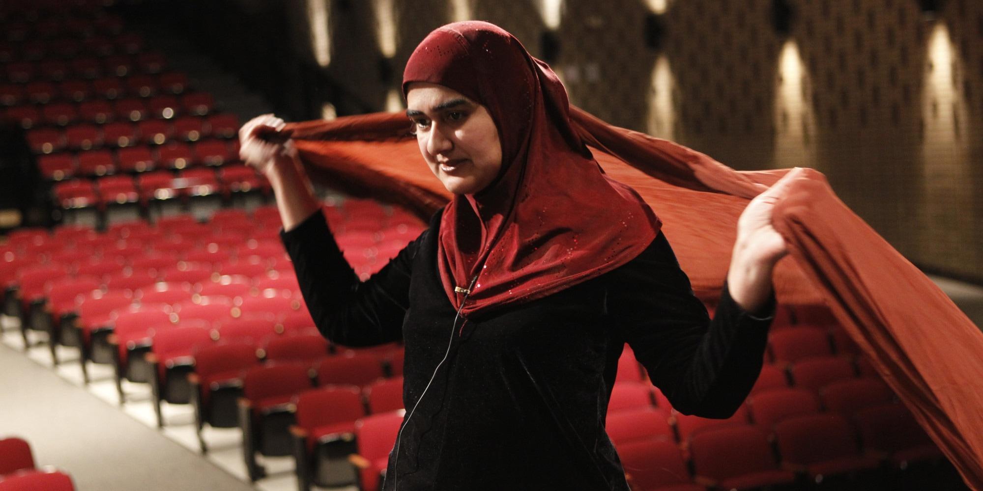 Playwright and actress Rohina Malik, formerly of Skokie and a Niles North High School graduate, prepares April 13, 2011 for a performance at Niles North, where she did three monologues as Muslim women characters. (Chris Walker/Chicago Tribune/MCT via Getty Images)
