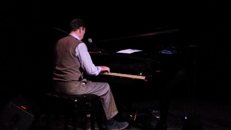 Livingston Taylor passionately playing piano to a comfortable crowd at the Playhouse Theatre in College of DuPage on Nov. 14, 2014.