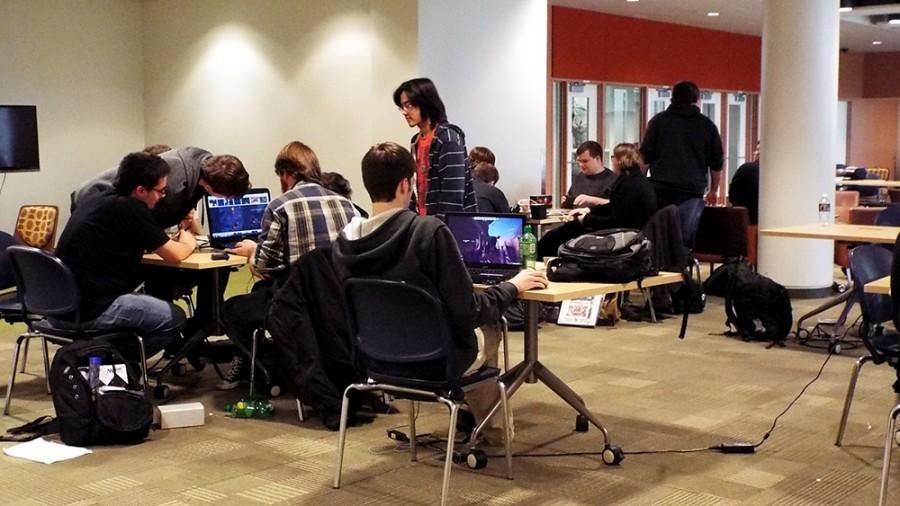 Students congregate in a study area at College of DuPage.