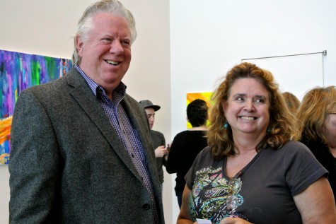 Mike Hunnicut and Jennifer Harith standing side-by-side as student and teacher in the Wings Gallery at the College of DuPage on Dec. 3rd, 2014. 