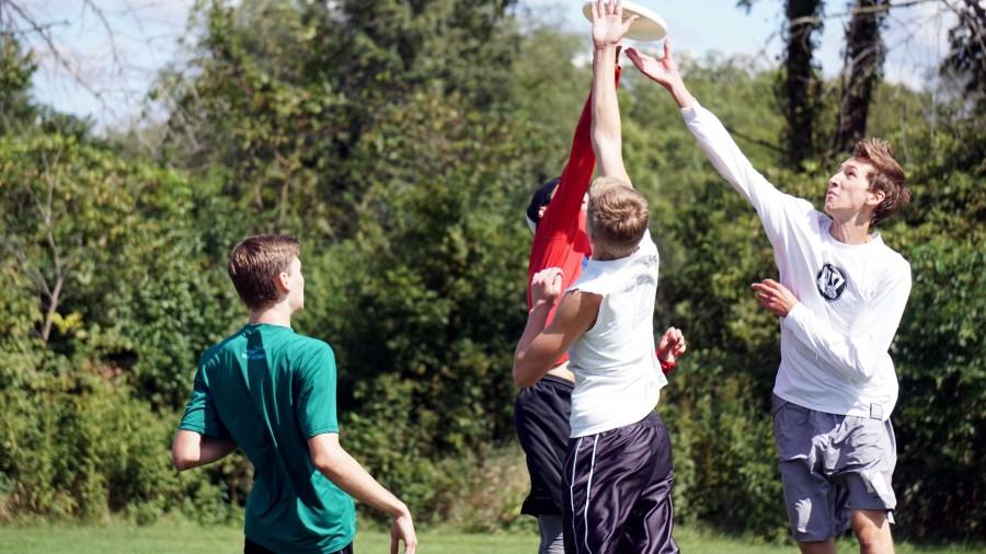 A group of players jump for the disc during an Ultimate Frisbee game at Knock Knolls Park in Naperville, Ill on Sept. 12. 