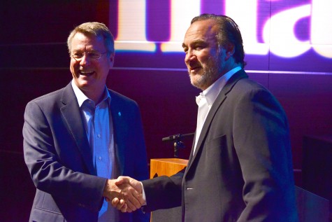 Jim Belushi and Joe Collins shake hands at the MAC on Sept. 12.