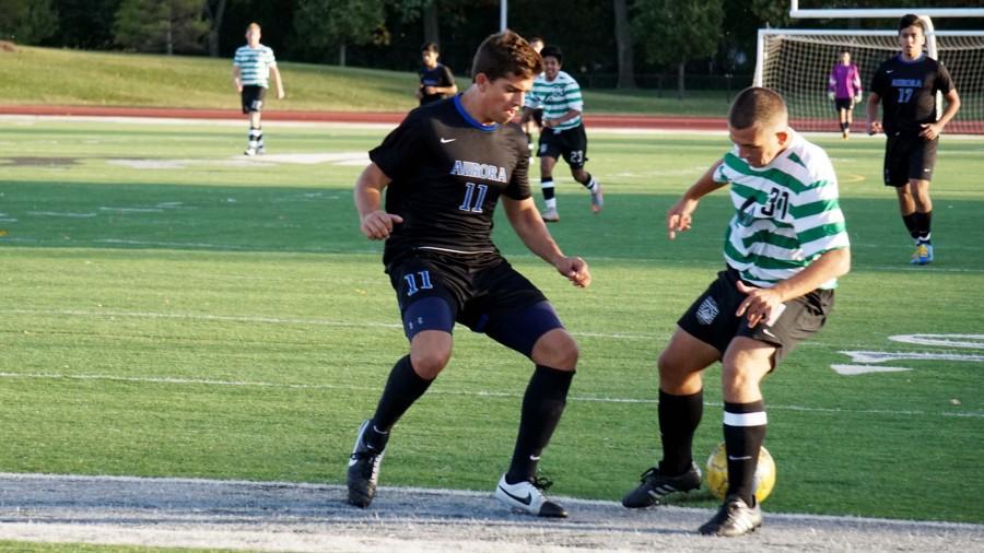 Chaparral Midfielder Zoran Tanasic juking past Aurora University JV Defender at the College of DuPage on Oct. 15.