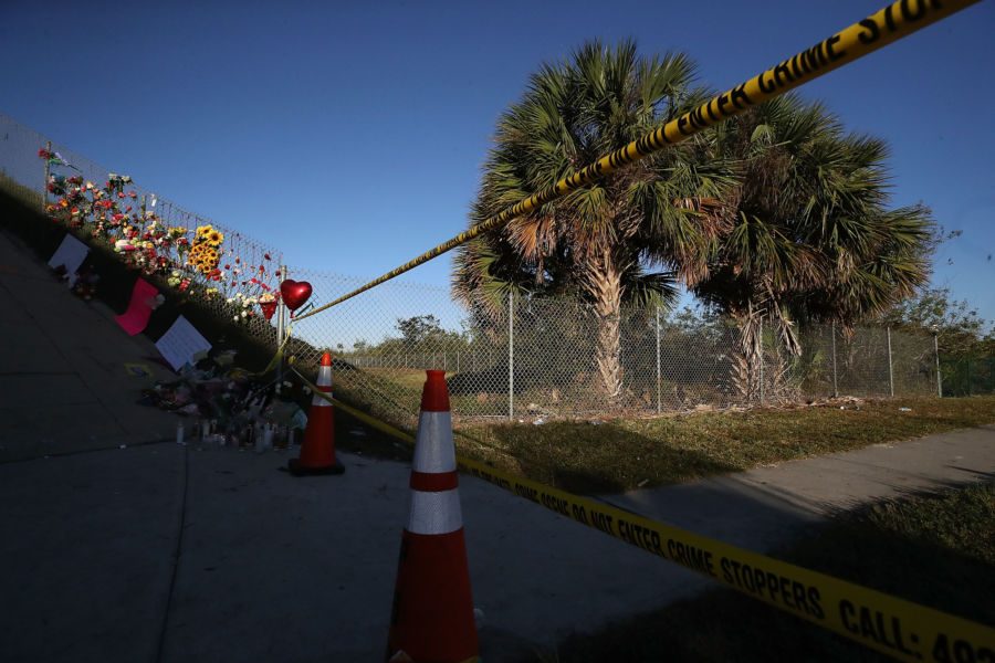 PARKLAND, FL - FEBRUARY 17: A sidewalk hat leads to Marjory Stoneman Douglas High School remains closed since the February 14 mass shooting, on February 17, 2018 in Parkland, Florida. Former student Nikolas Cruz has been arrested and charged for the 17 murders.  (Photo by Mark Wilson/Getty Images)