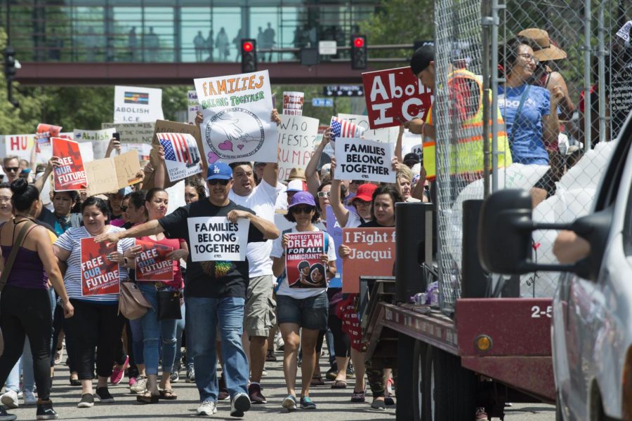 Protesters march through the streets of Minneapolis, MN, demanding President Trump end his “zero-tolerance immigration policy.” Before Trump eventually reversed his policy, capitulating to political pressure and nationwide-public outrage, over 2,500 immigrant children were separated from their families following Attorney General Jeff Sessions’ policy announcement on April 6. Trump’s policies have also made it harder for refugees to claim asylum once they cross the southern border.