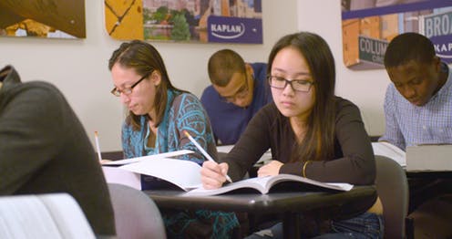 Students prep for the SAT at a test prep center in New York City.