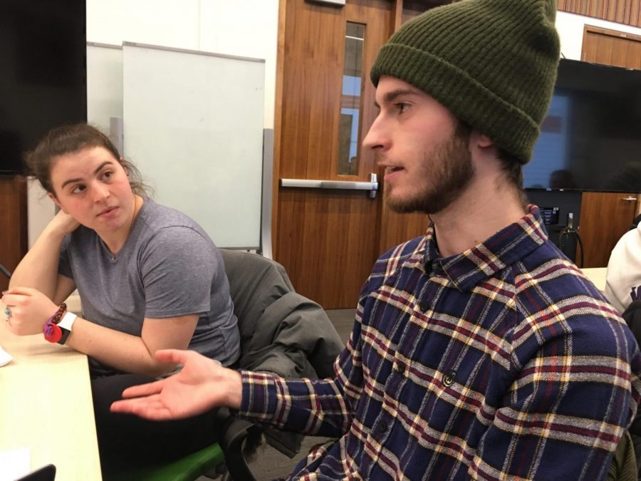 Julia Pascale, a sophomore from Baltimore, and Kyle Herbstreit, a junior from Stevensville, Michigan, discuss the death penalty during a session sponsored by WeListen, a bipartisan student group at the University of Michigan.  