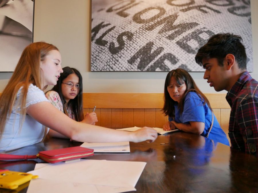 High school tutors of Dialekt, a non-profit, help immigrant learners with math and reading comprehension skills necessary for adjusting to new jobs in America (photo by Brian Schatteman)  