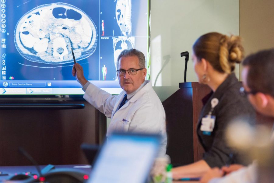 Dr. William Hartsell medical director of Northwestern Medicine Chicago Proton Center in Warrenville planning treatment to use protons to break down a patient’s tumor (photo provided by Northwestern Medicine) 