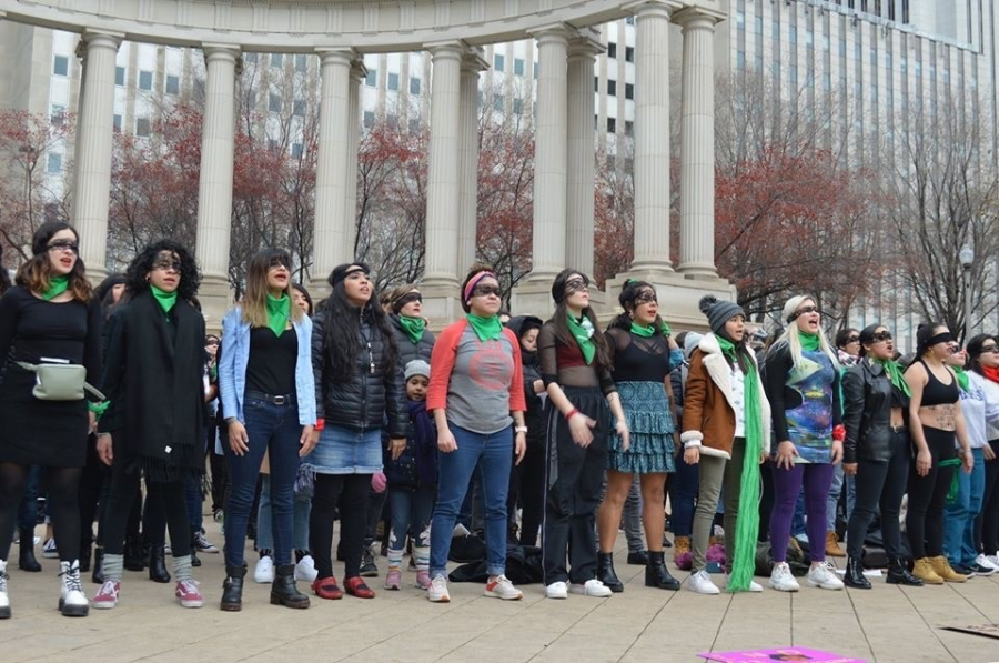 Demonstrators in Chicago wear blindfolds to protest societys blindness to violence against women and to remember the women who have been silenced by femicide (photo by Gabriela Hernandez Chico)