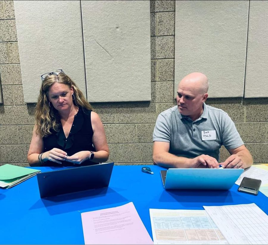 Attorneys Mia McPherson and Brett Cummins lending their expertise at the clinic. Photo provided by the Public Interest Law Initiative.