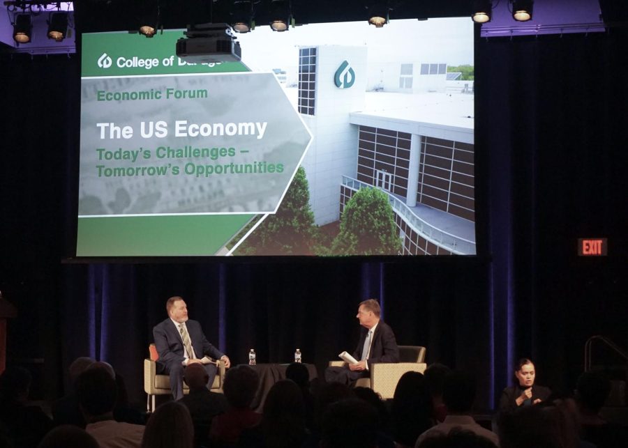 President of the Federal Reserve Bank of Chicago, Charles Evans (right),  answers questions from CODs  assistant vice president for economic development, Joseph Cassidy