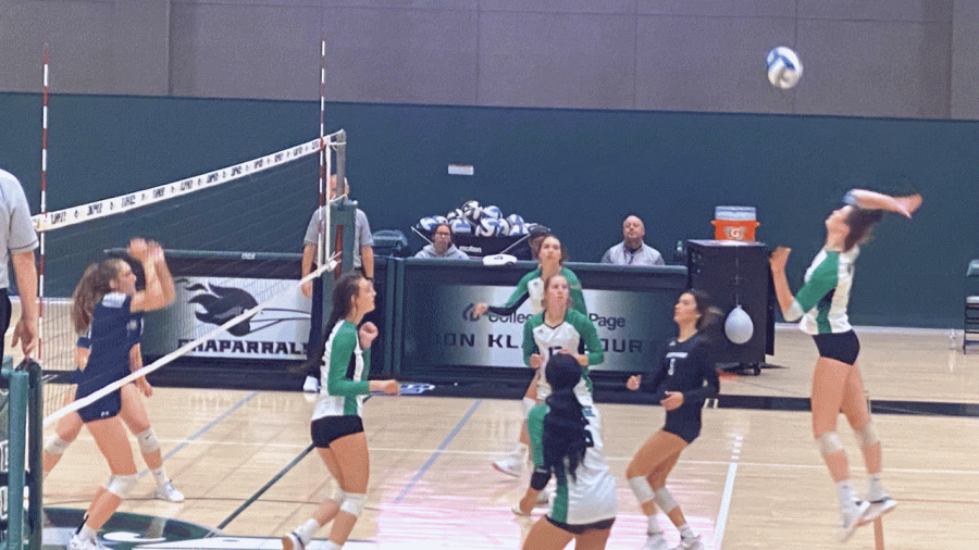 Chloey Myers executes a kill in first Region IV tournament game against Madison College. 