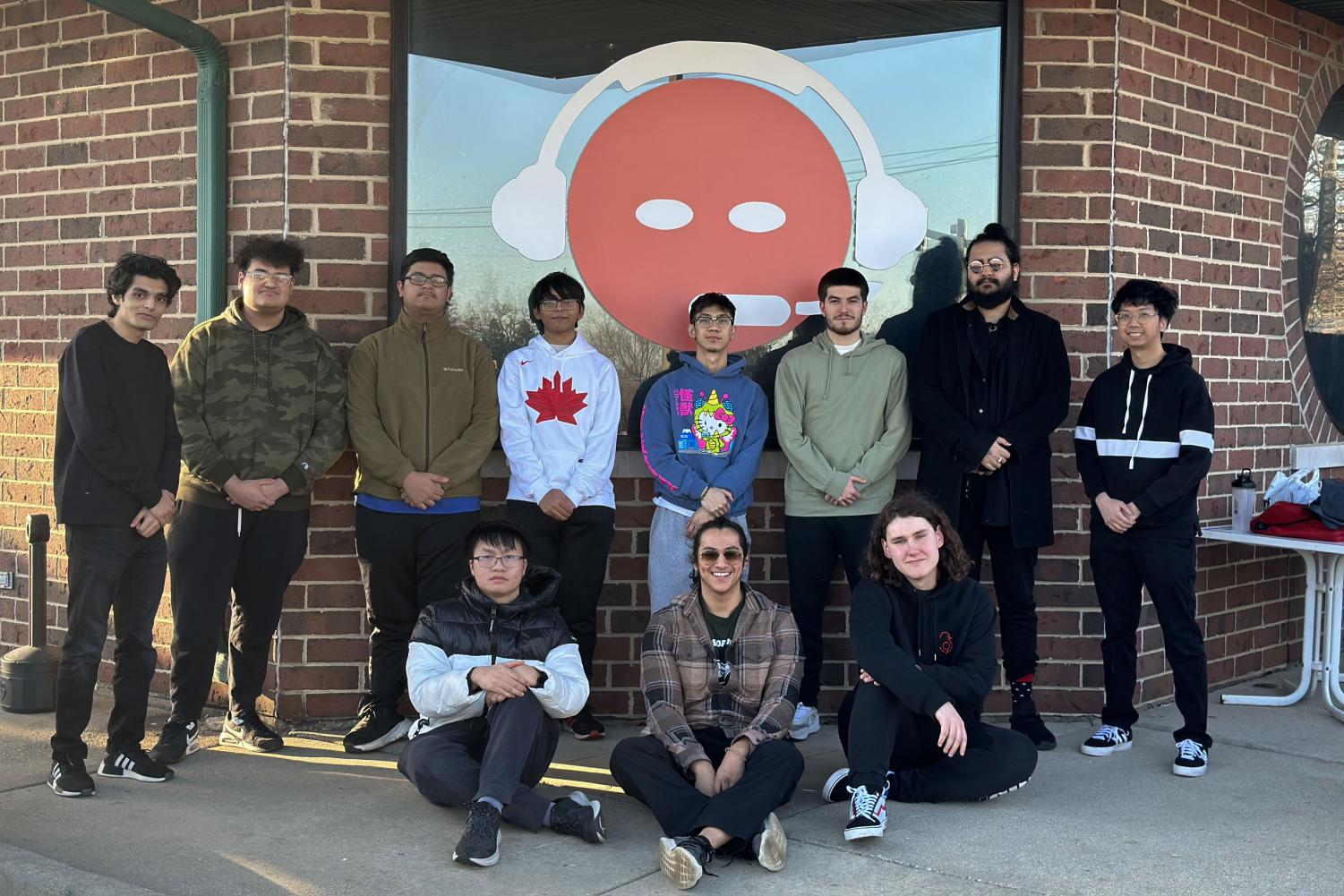 Members of COD's eSports standing outside of Scrims esports center