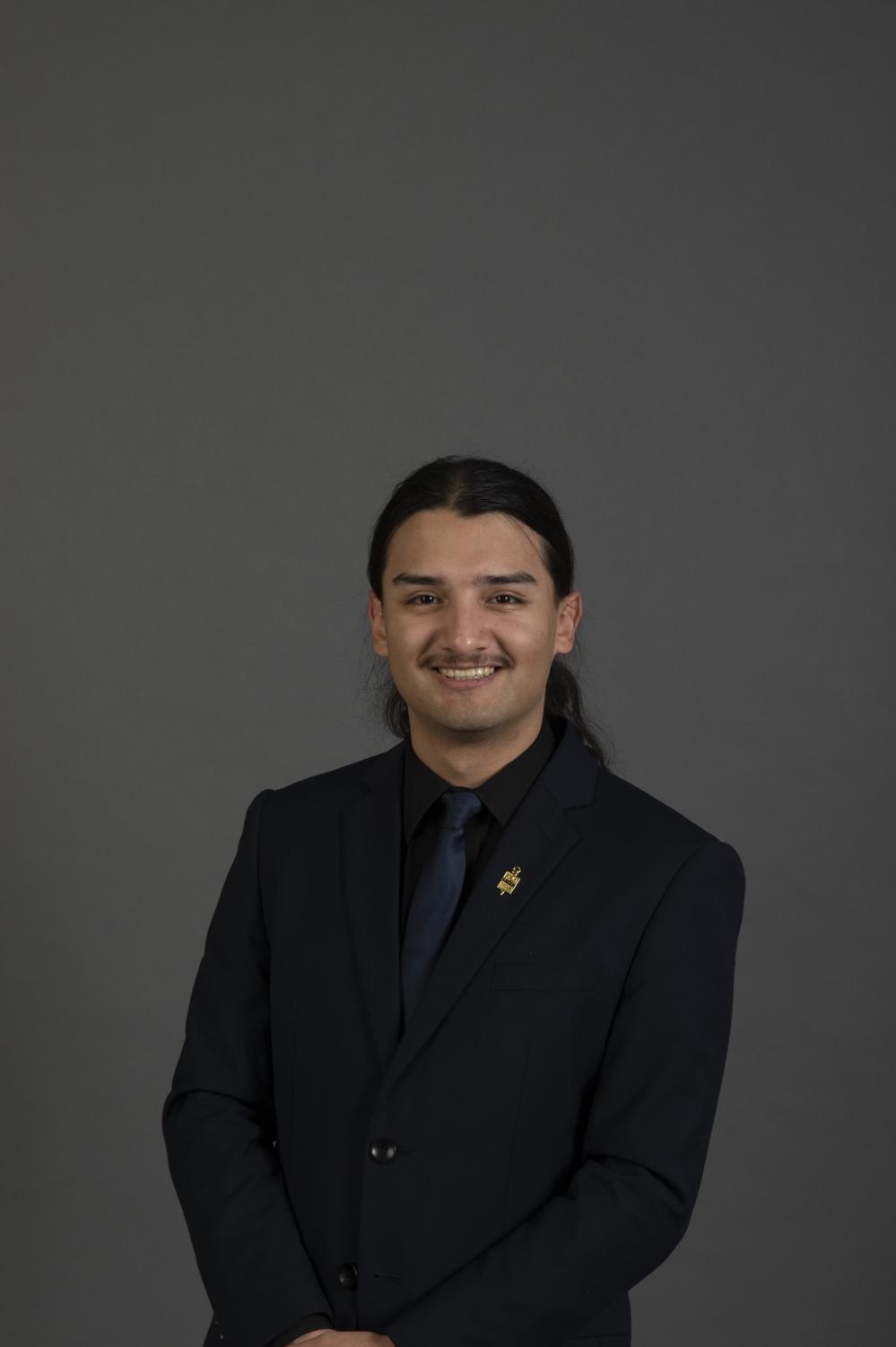A professional photo of Luis Medina