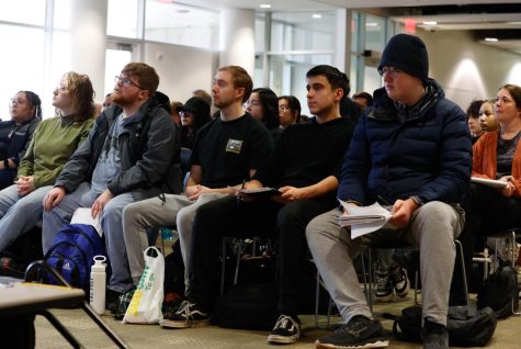 Students listen to Souzan Naser's presentation