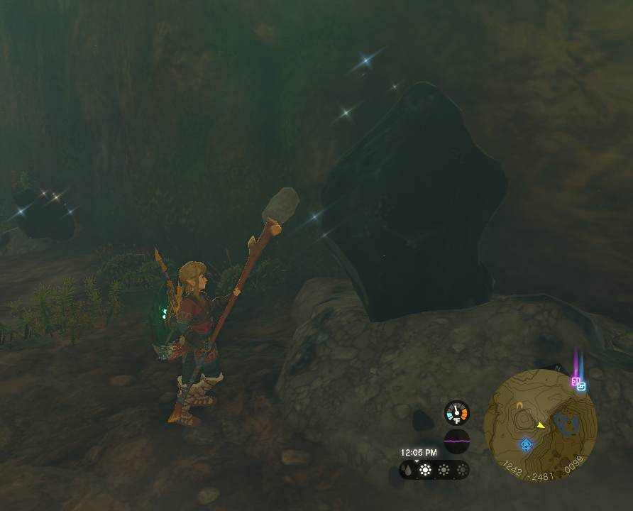 Play character Link stands next to a glittering, breakable rock