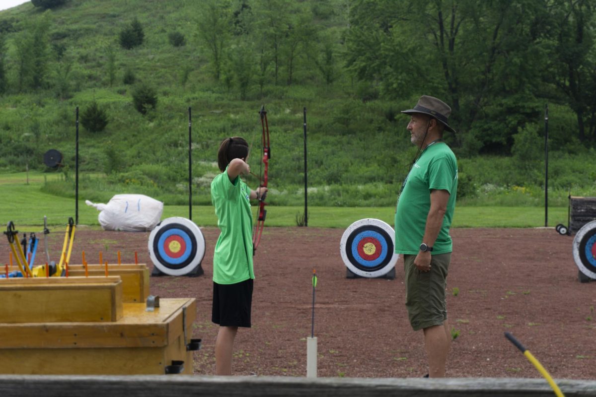 Instructors guided each person while attempting to shoot their target.