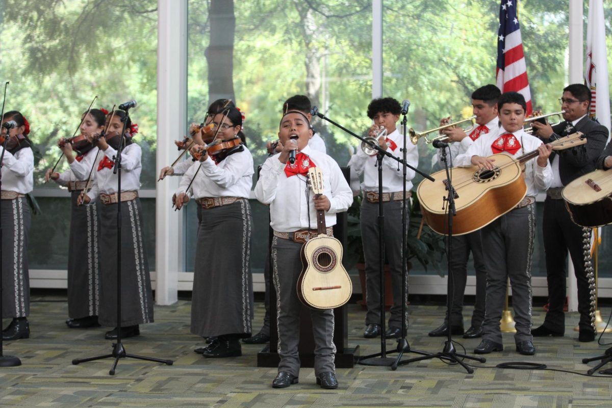 A student from Mariachi los Pumas de Jovita Idár Elementary sings a solo.