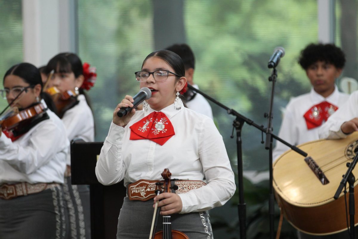 A student from Mariachi los Pumas de Jovita Idár Elementary sings a solo.
