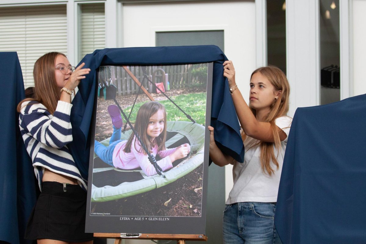 Lydia’s portrait is revealed at the Easterseals ceremony. The photo was taken by Barbara Overland.