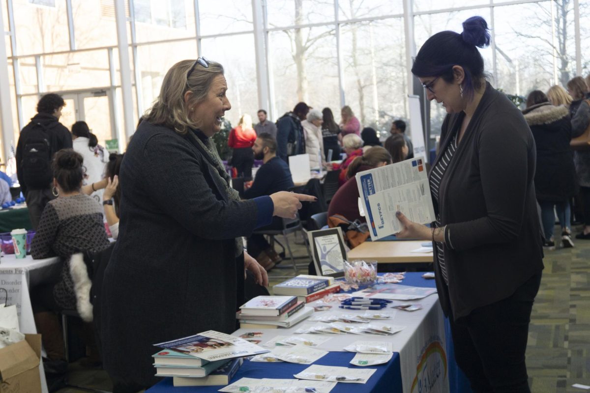 There were many tables that offered different types of resources for specific needs. The atrium was crowded with students.