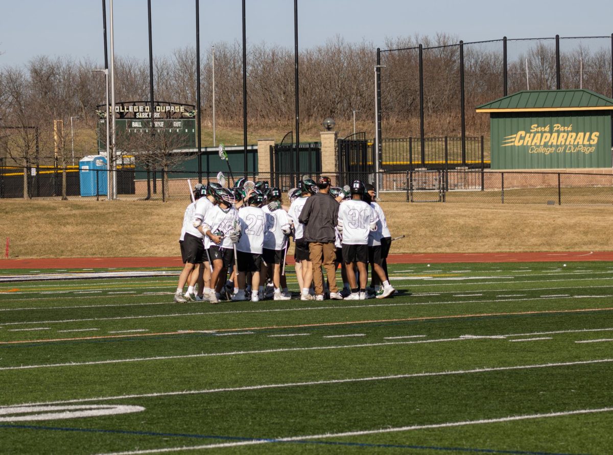 The COD mens lacrosse team takes a timeout. 