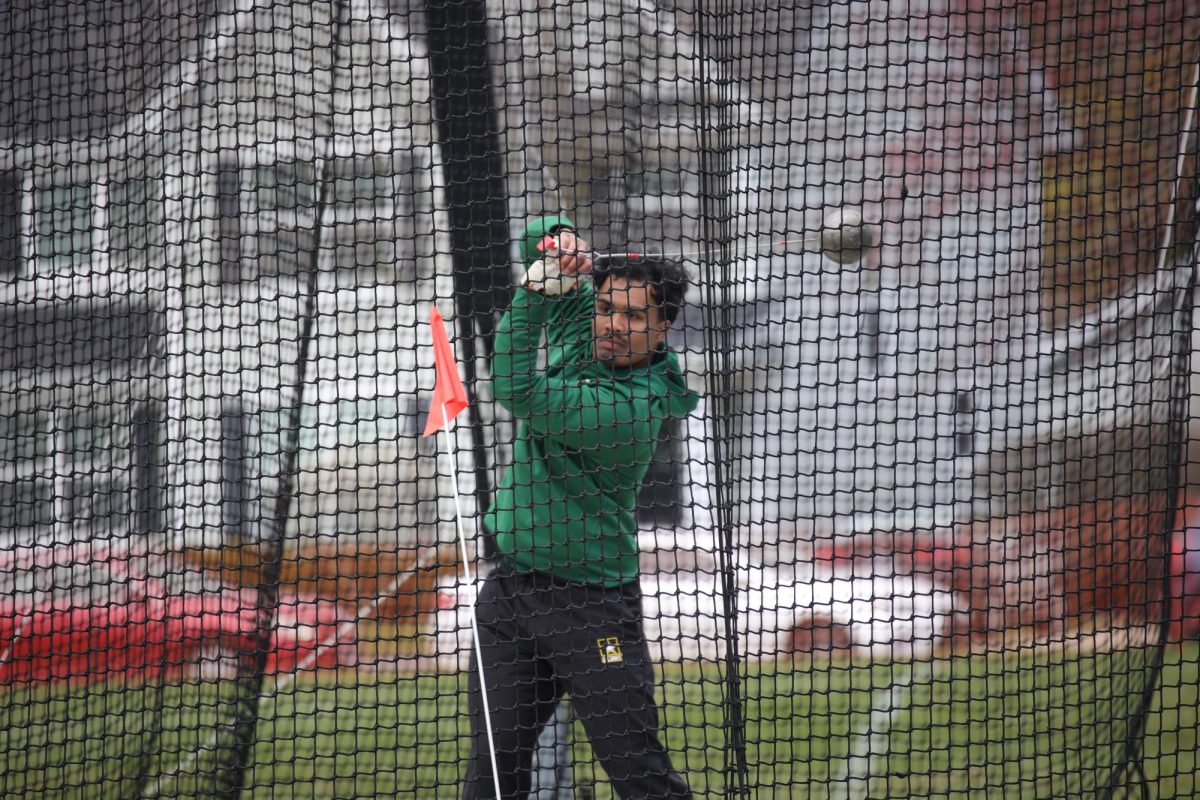 Sophomore Isaias Lopez competes in the hammer throw. 