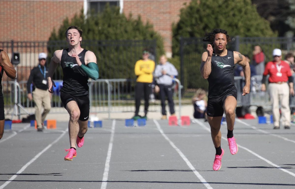 Freshman Weston White and sophomore Noah Mack compete in the 100-meter dash final. 