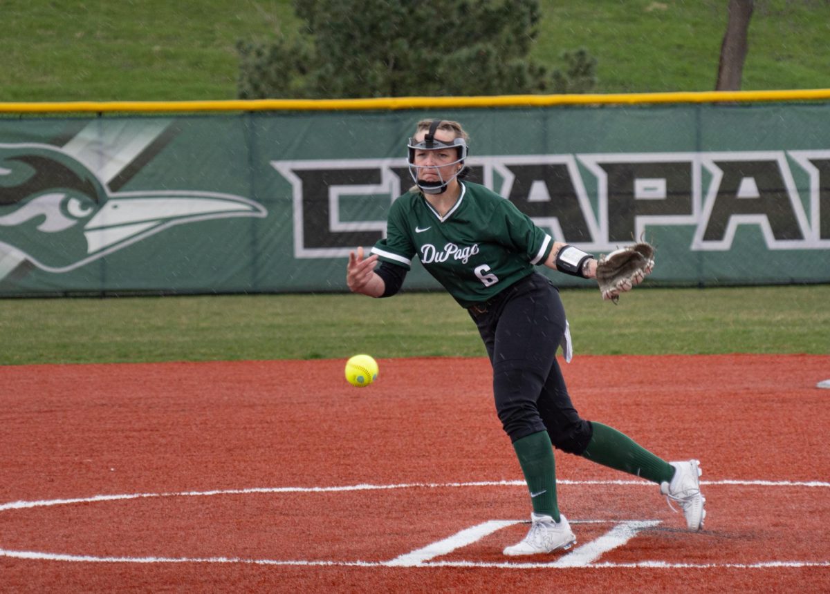 Freshman pitcher and outfielder Taylor Gloms throws a pitch. 