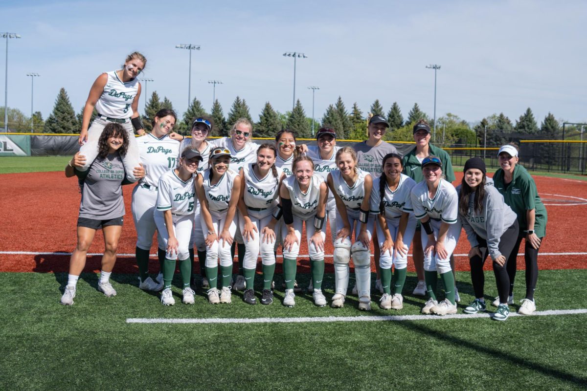The COD softball team poses for a portrait. 
