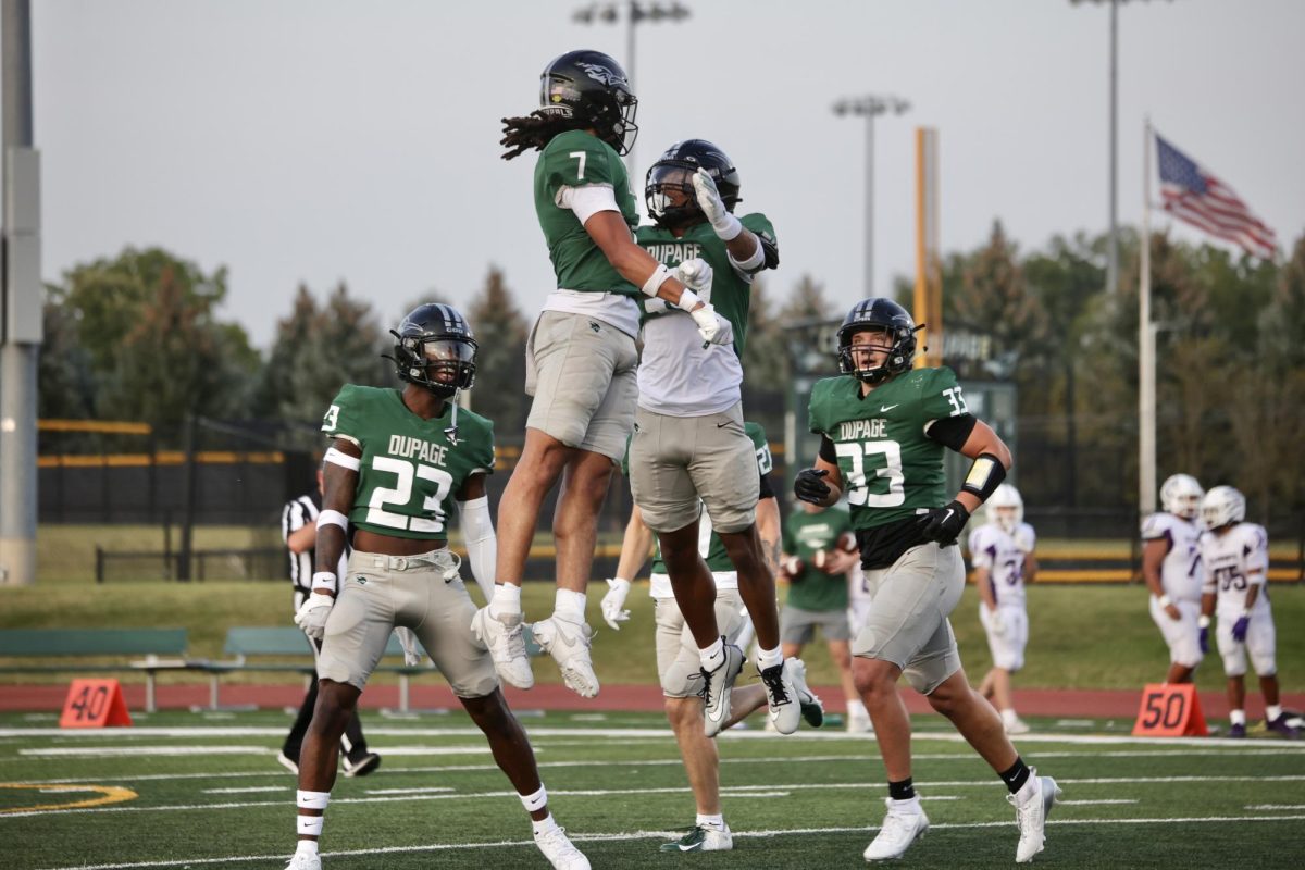 The COD defense celebrates after making a tackle. 