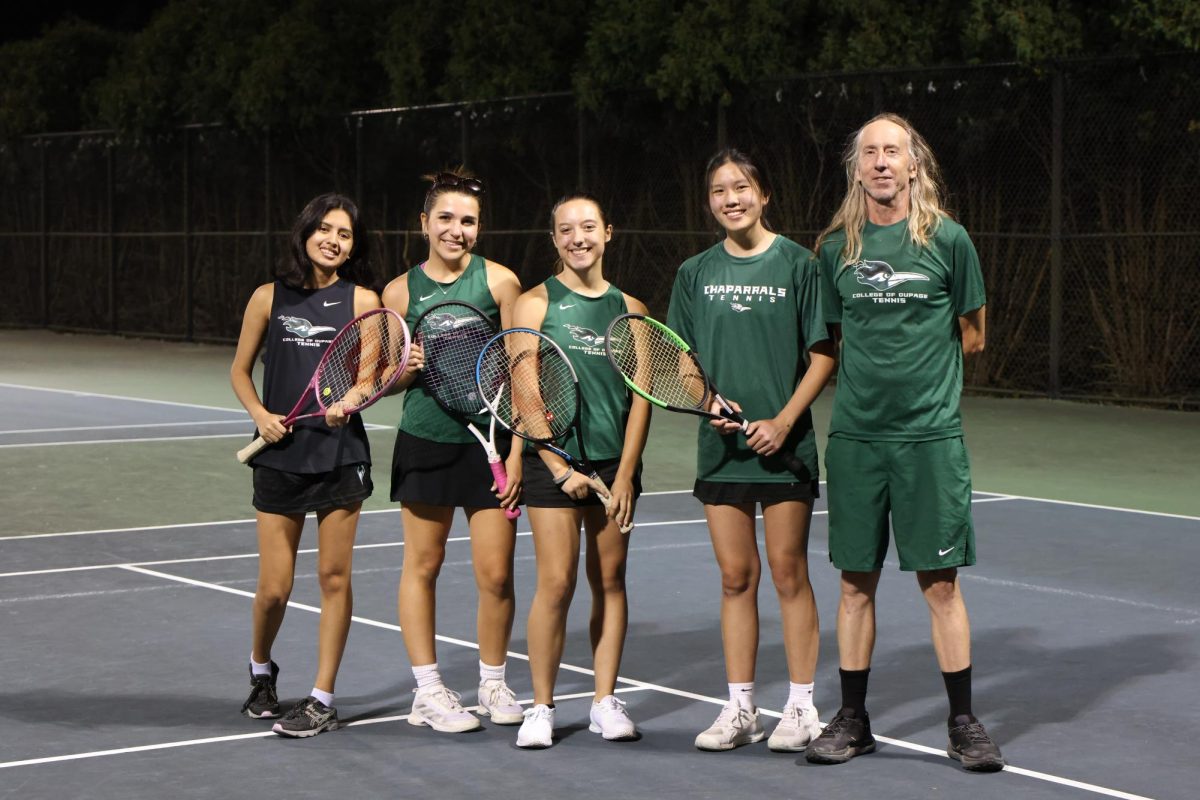 The COD women's tennis team poses for a portrait. 