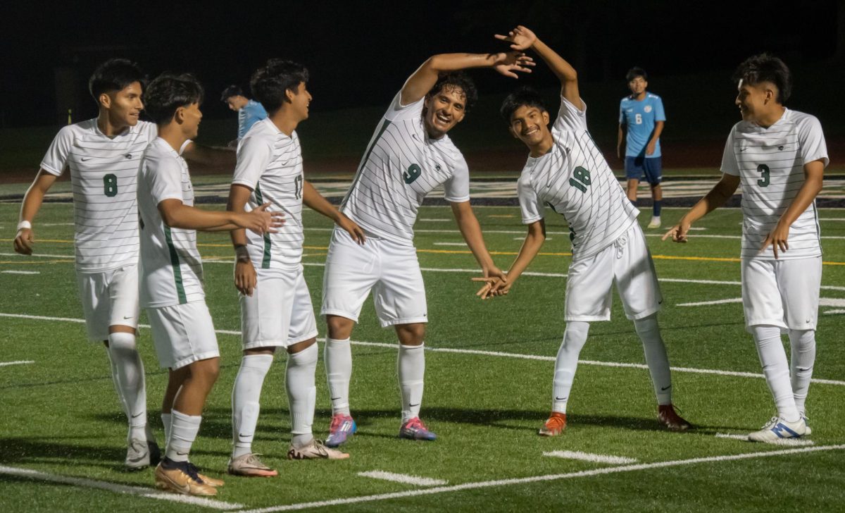 The team doing a “Dragon Ball” celebration after a goal.
