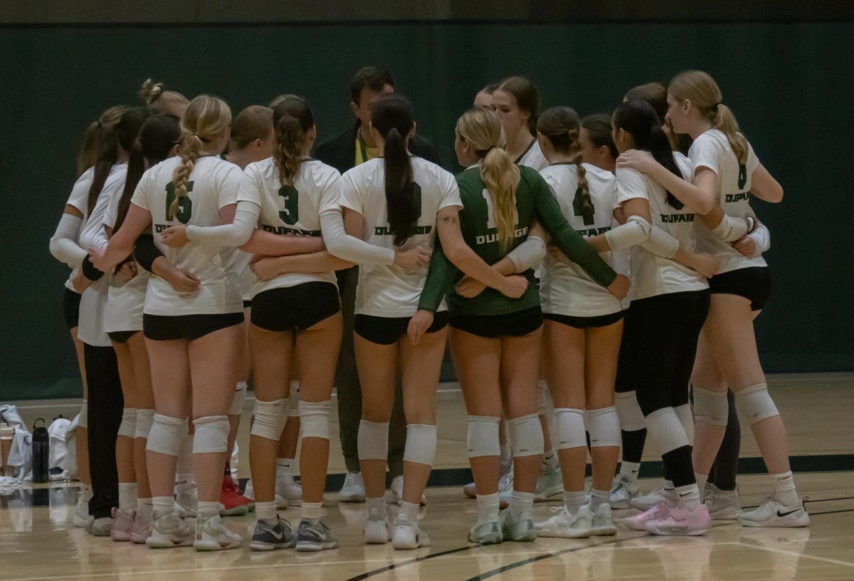 The team in a huddle.
