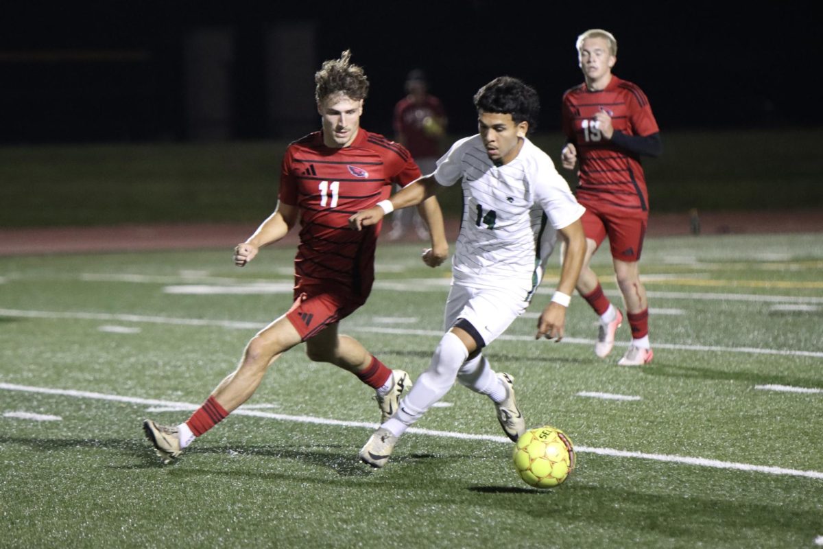 COD's Luis Gutierrez getting pressured by a Northeastern defender 