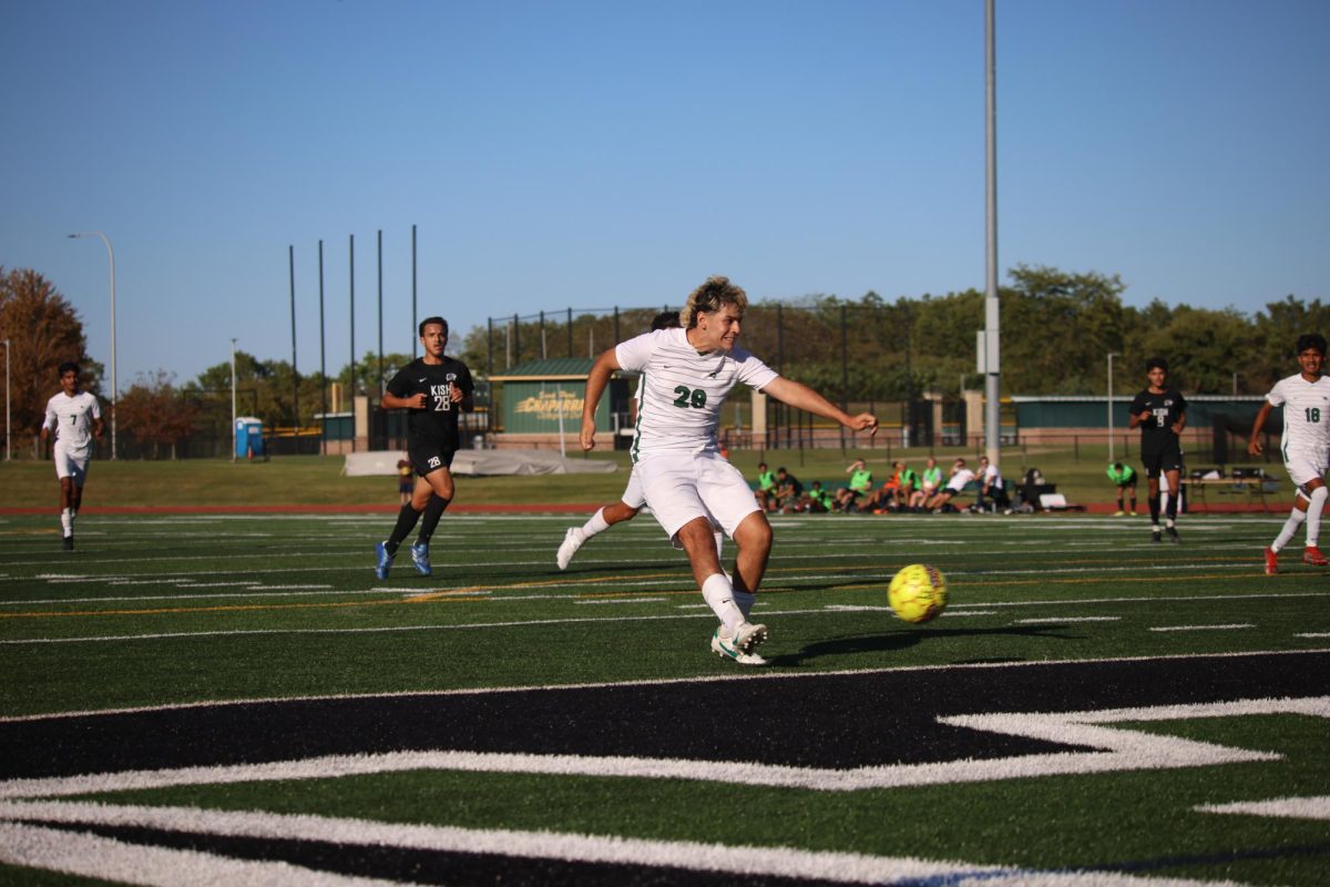 Freshman Dylan Ferreira attempts to score. 