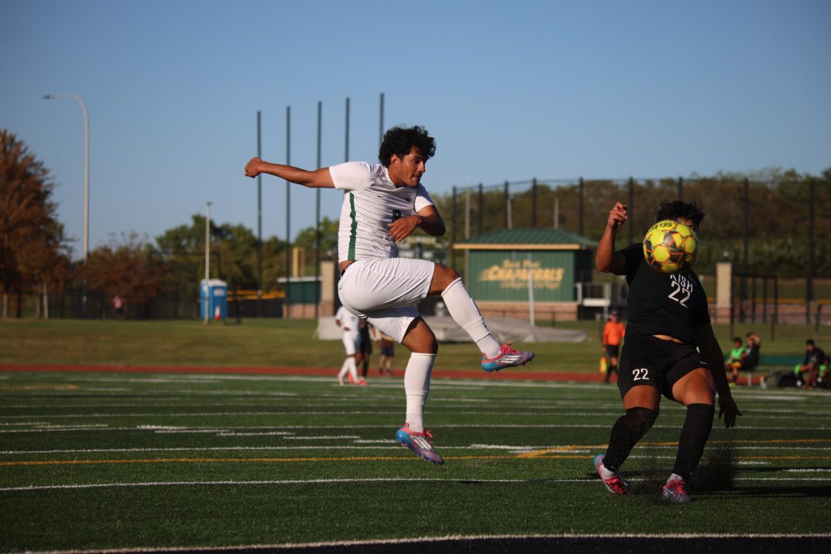 Freshman Anthony Juarez kicks the ball. 