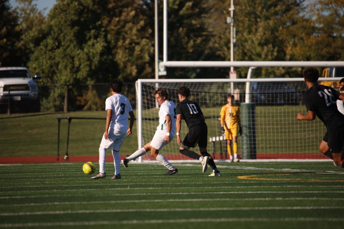 Sophomore Emiliano Lagunas passes the ball. 