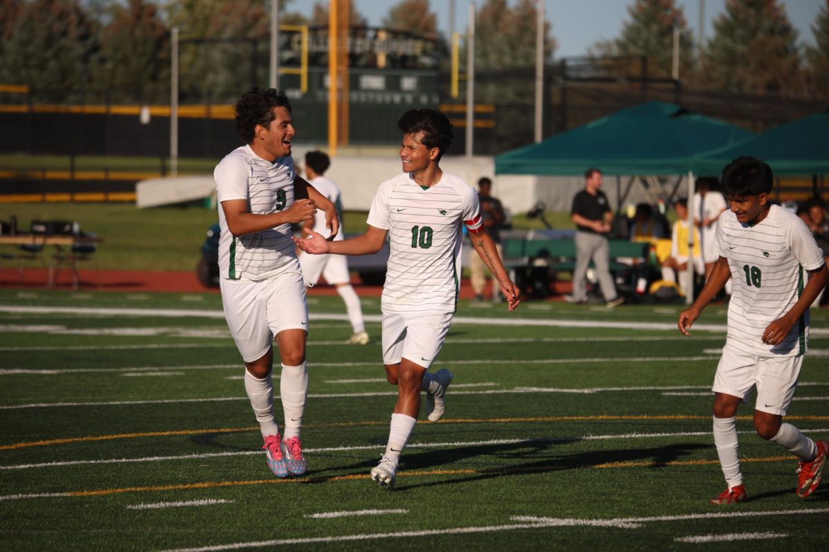 Alexis Hernandez celebrates with teammates after scoring a goal.