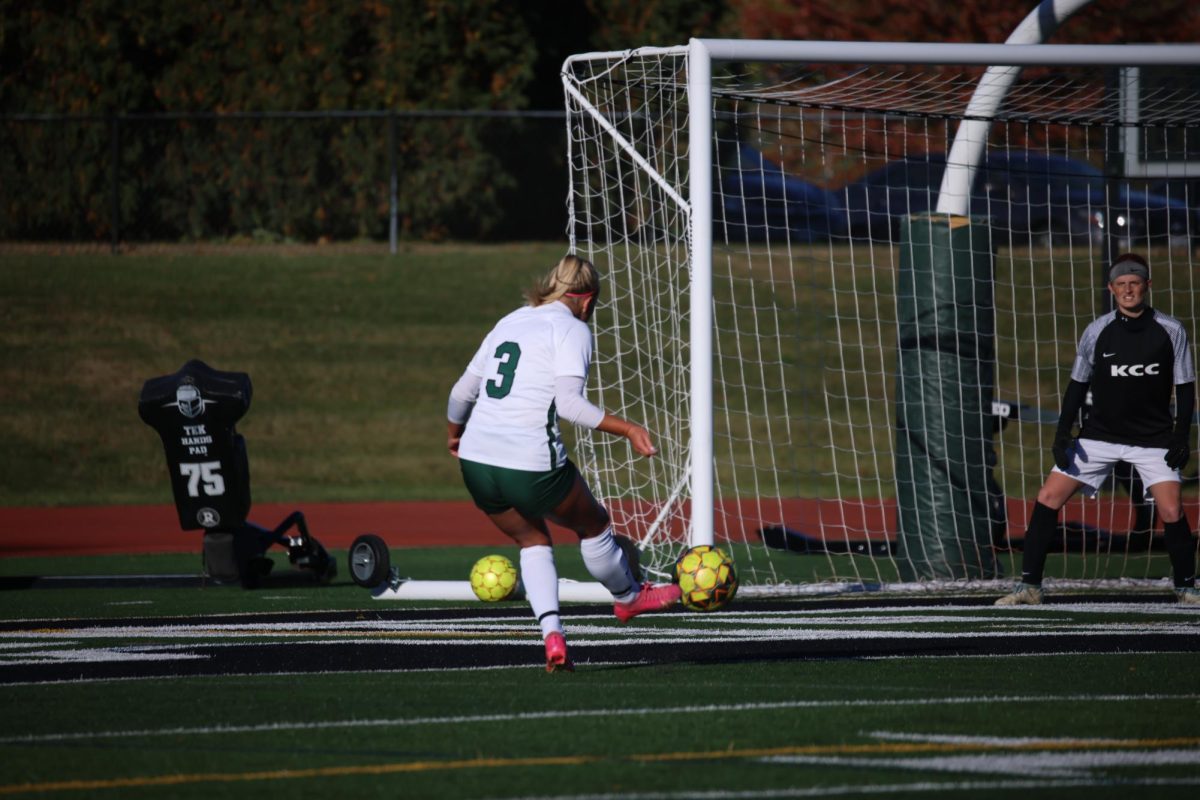 Freshman Grace Soltys attempts to score. 