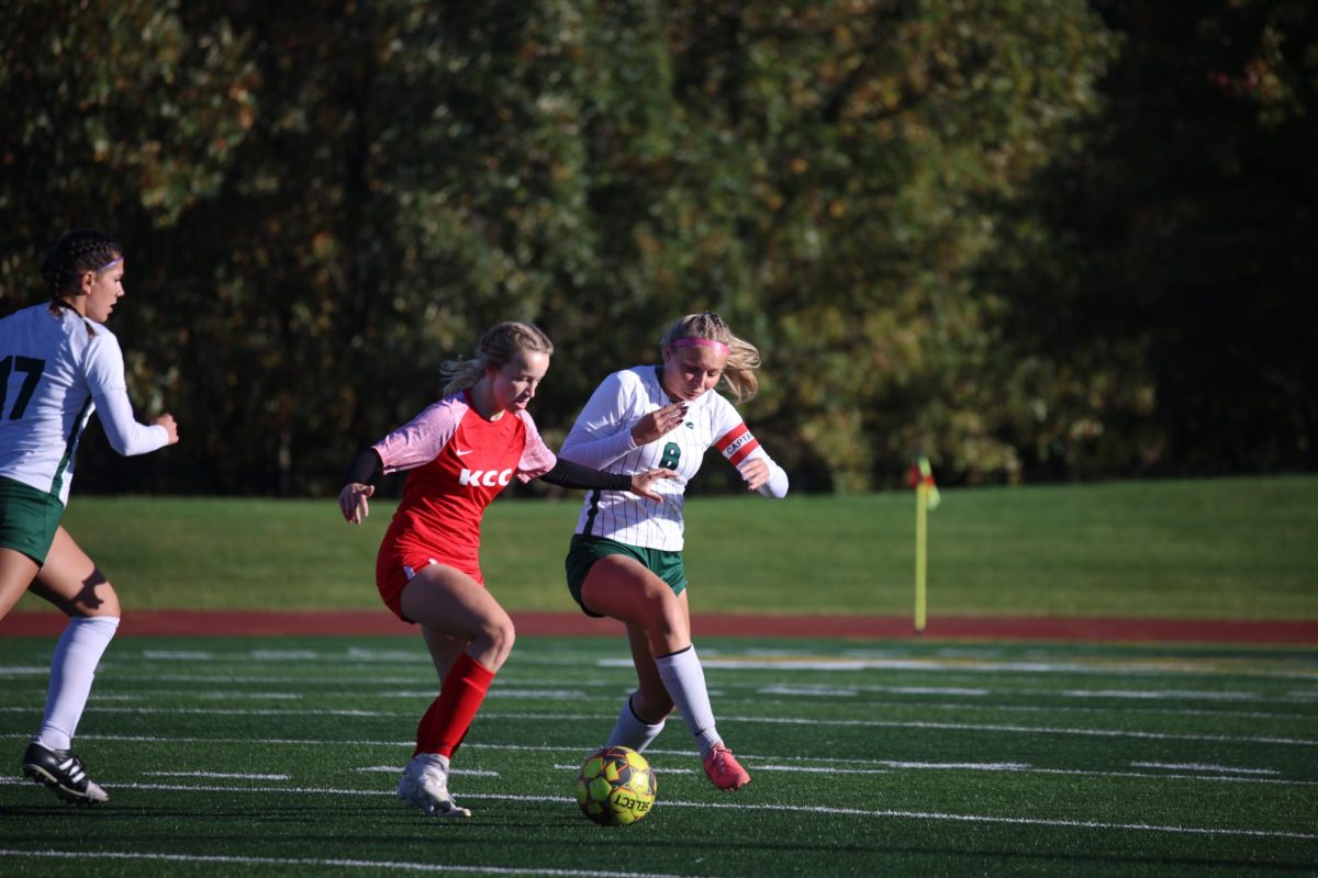 Sophomore Alyssa Basford tries to gain control of the ball. 