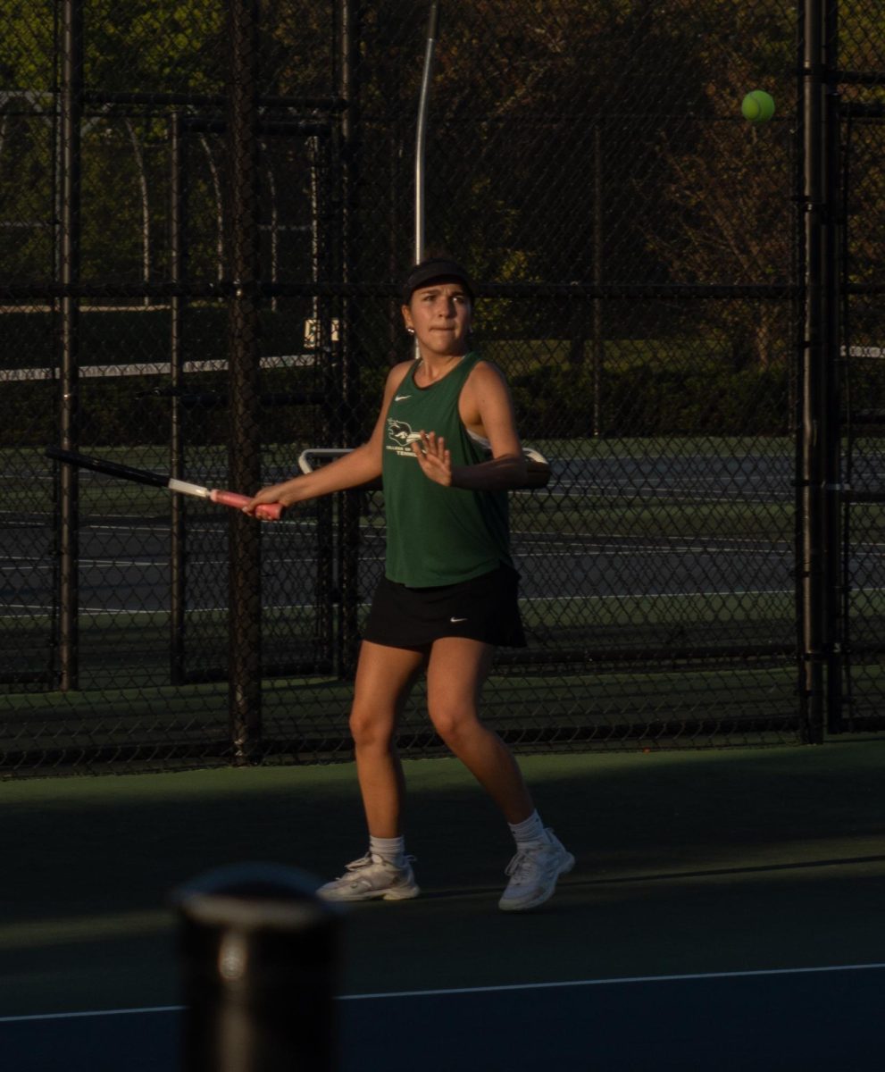 Kaitlin Murphy eyeing the tennis ball.
