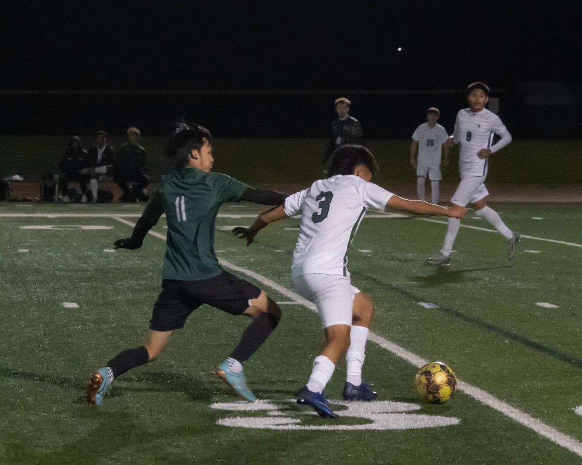 Number 3, Gustavo Ramirez trying to juke a defender.