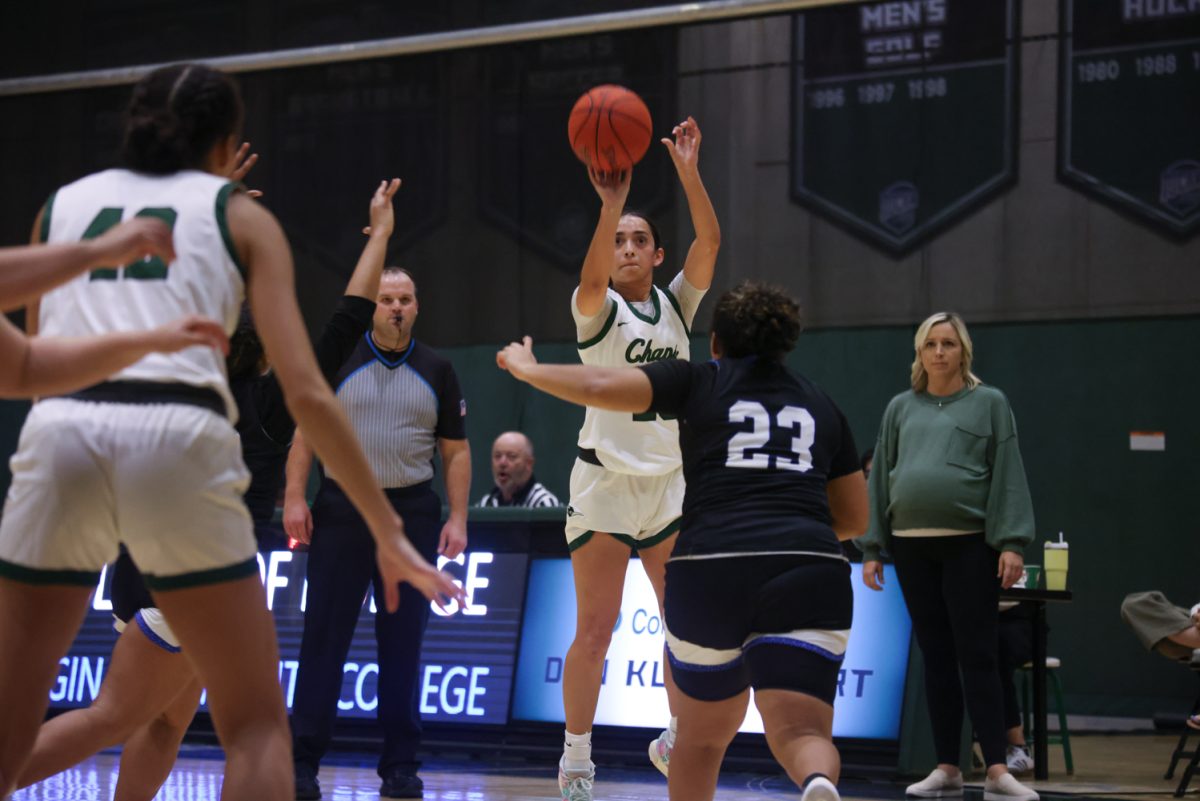 Sophomore Megan Martinez scores a three point shot. 