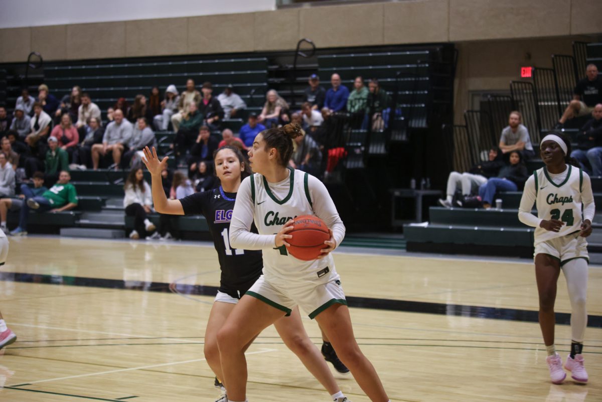 Sophomore Teegan Roach rebounds the ball. 