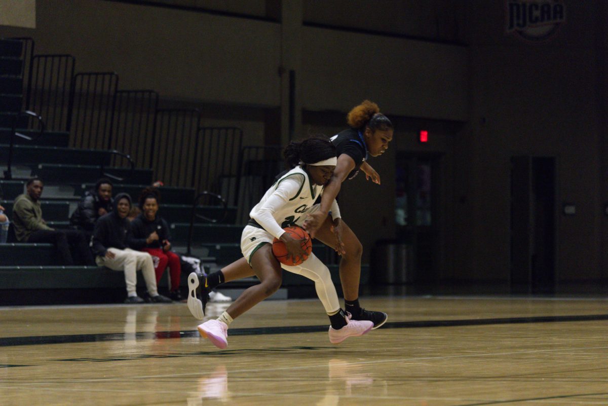 Sophomore Nala Taylor gains control of the ball.