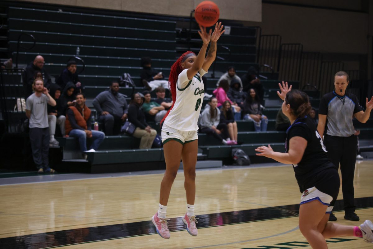 Freshman Jaylen Zachary shoots a three point shot. 