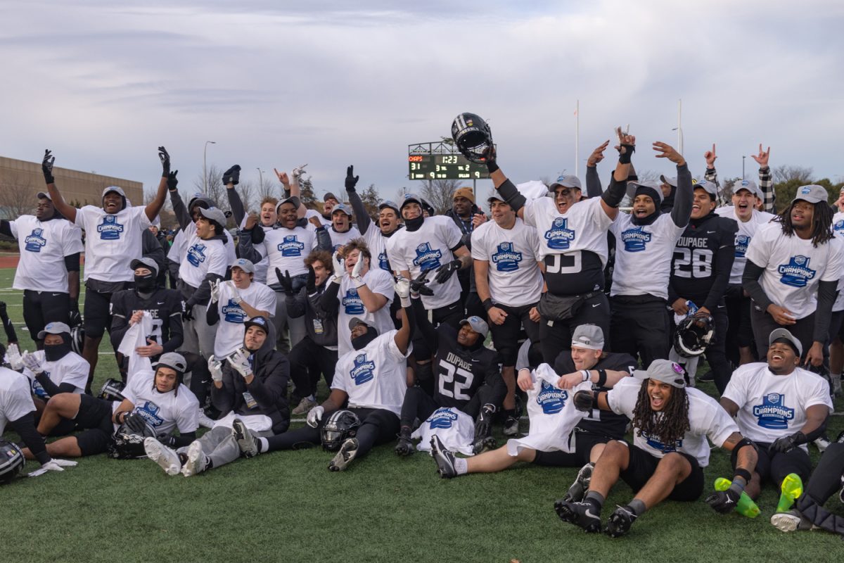 The COD football team celebrates after winning the national championship. 