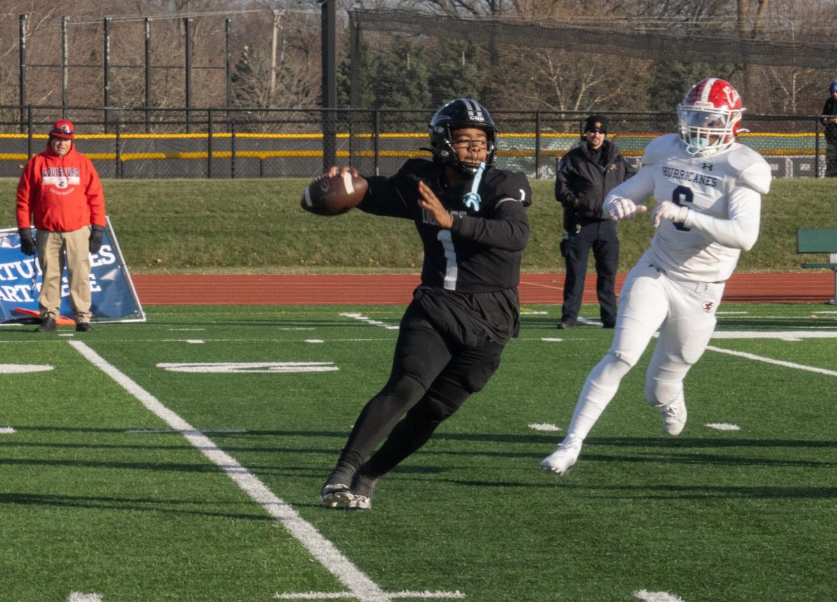 Freshman quarterback Justin Bland makes a throw. 